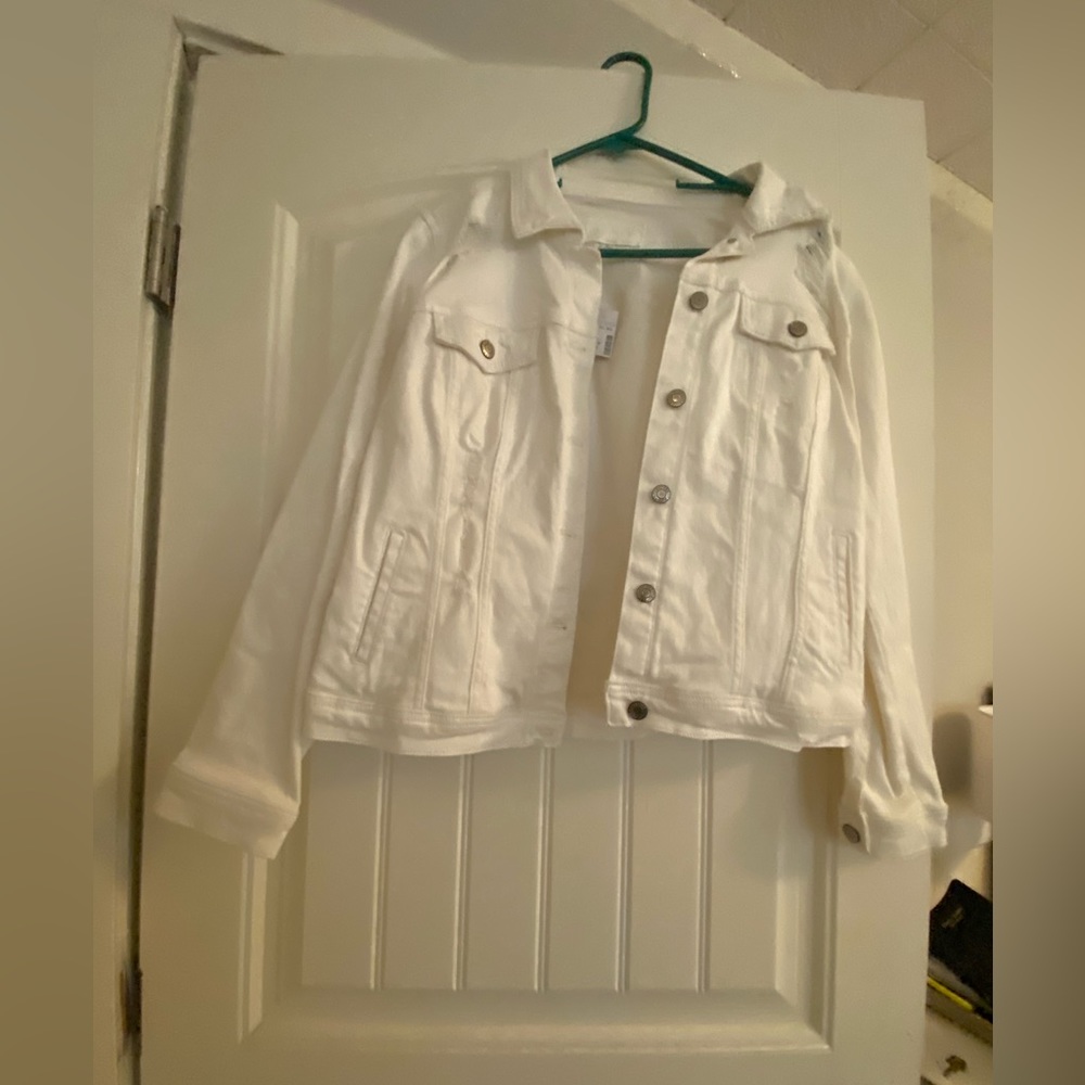 white jean jacket with tags